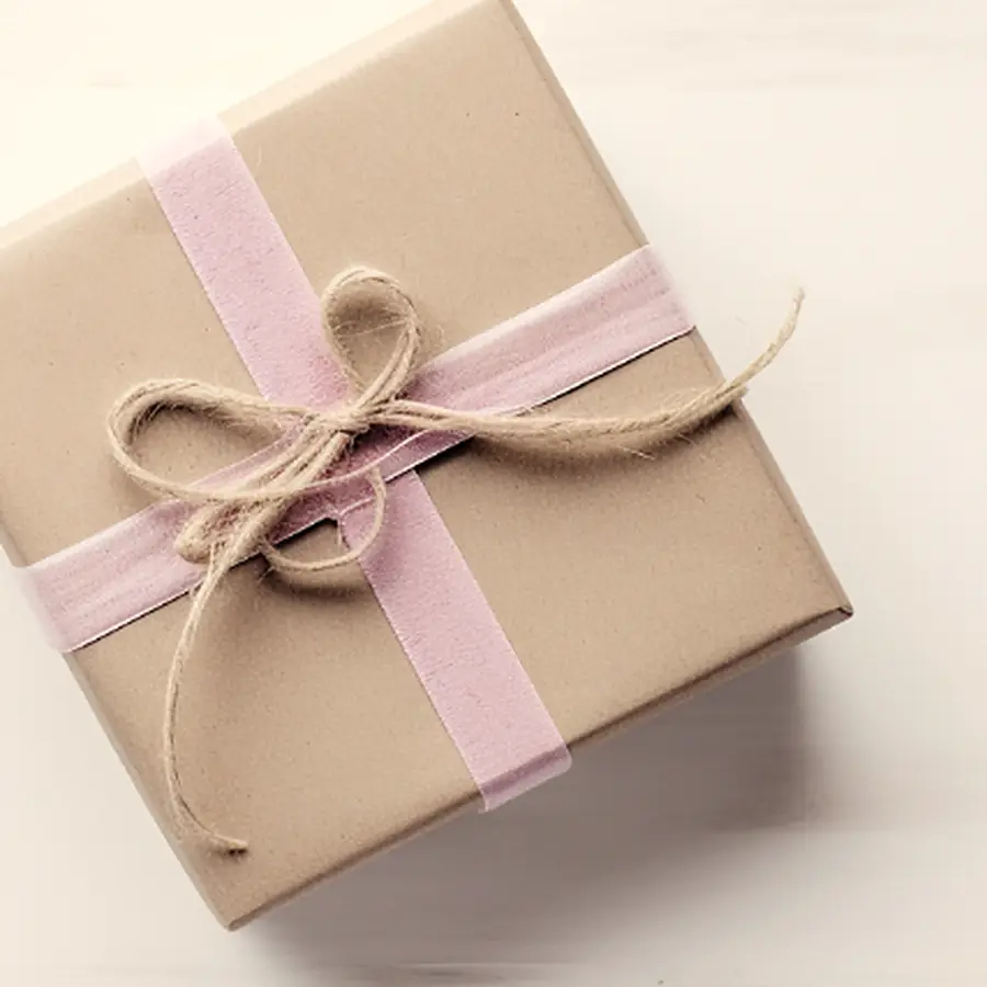 Kraft-paper gift wrapping tied with twine.